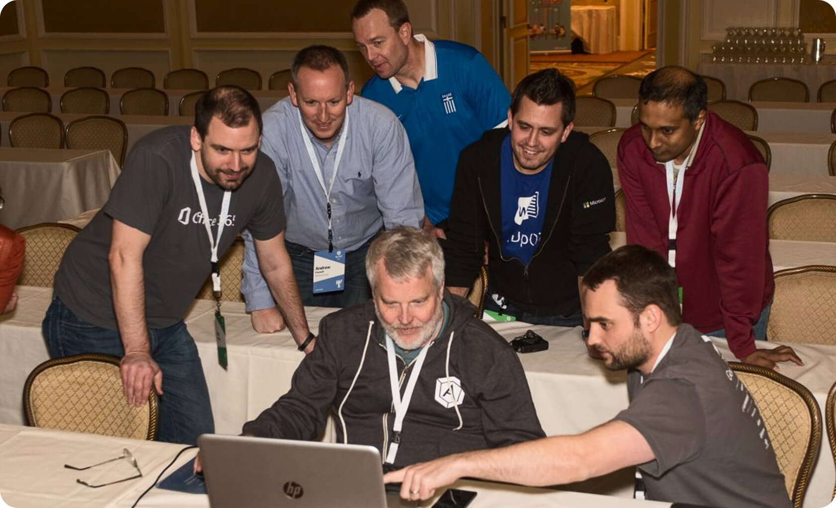 men watching laptop